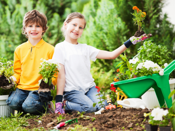 outside kids activities - kids planting their own garden