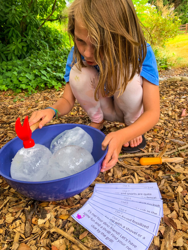 dinosaur egg scavenger hunt activity for kids- Travel blogger Nikki Harrington shares seven ideas that will turn your backyard into the ultimate (easy) family camping adventure!